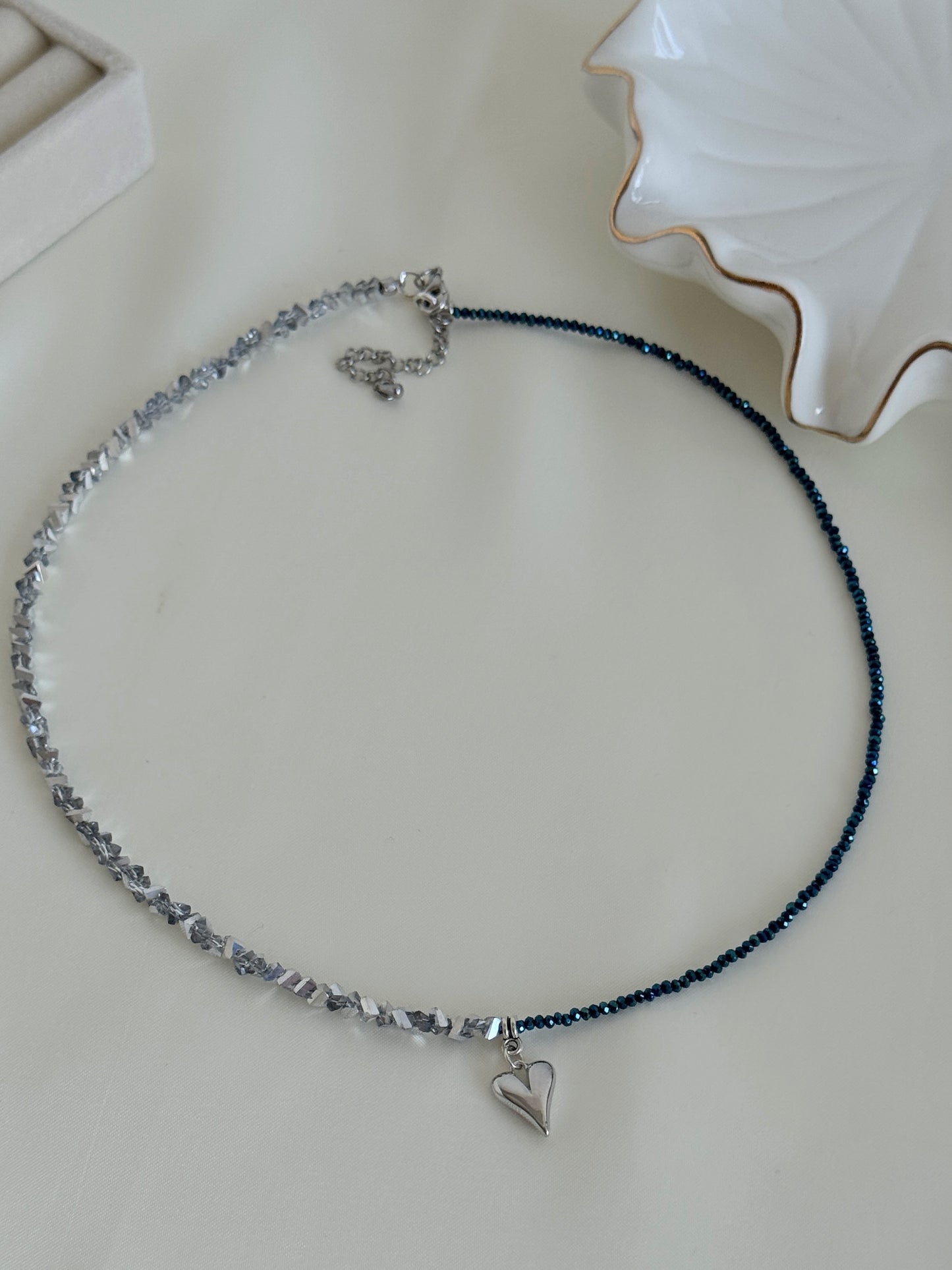 Half silver hematite chip and half dark blue crystal bead necklace with silver heart pendant