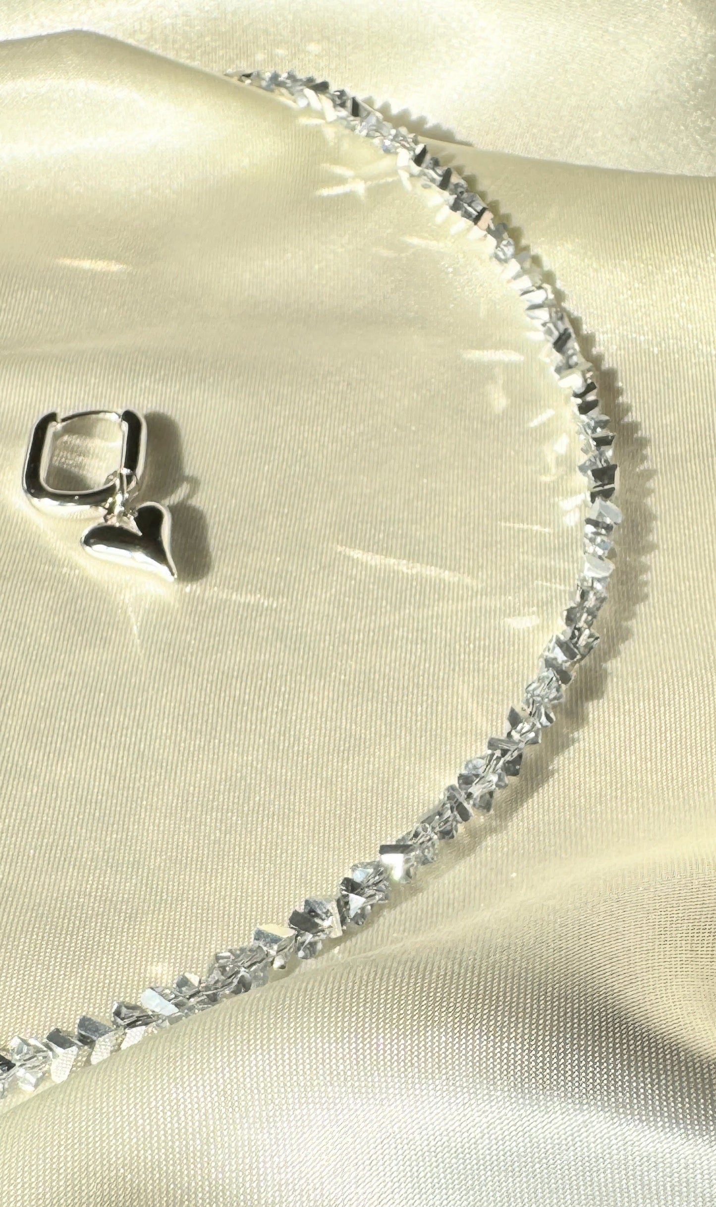 Silver crystal heart jewelry set with layered necklace and dangling earrings