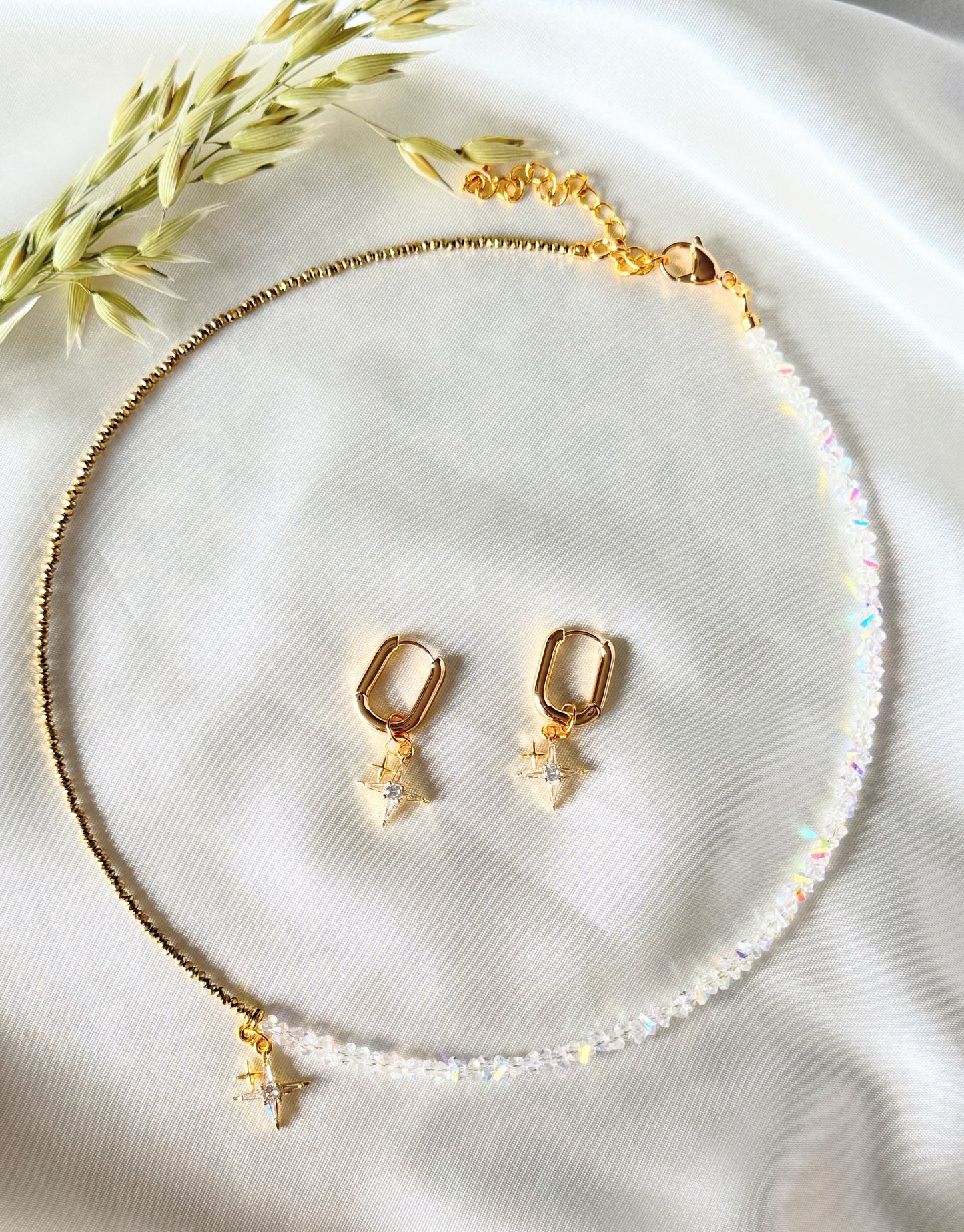 Elegant gold star charm necklace with matching hematite crystal earrings