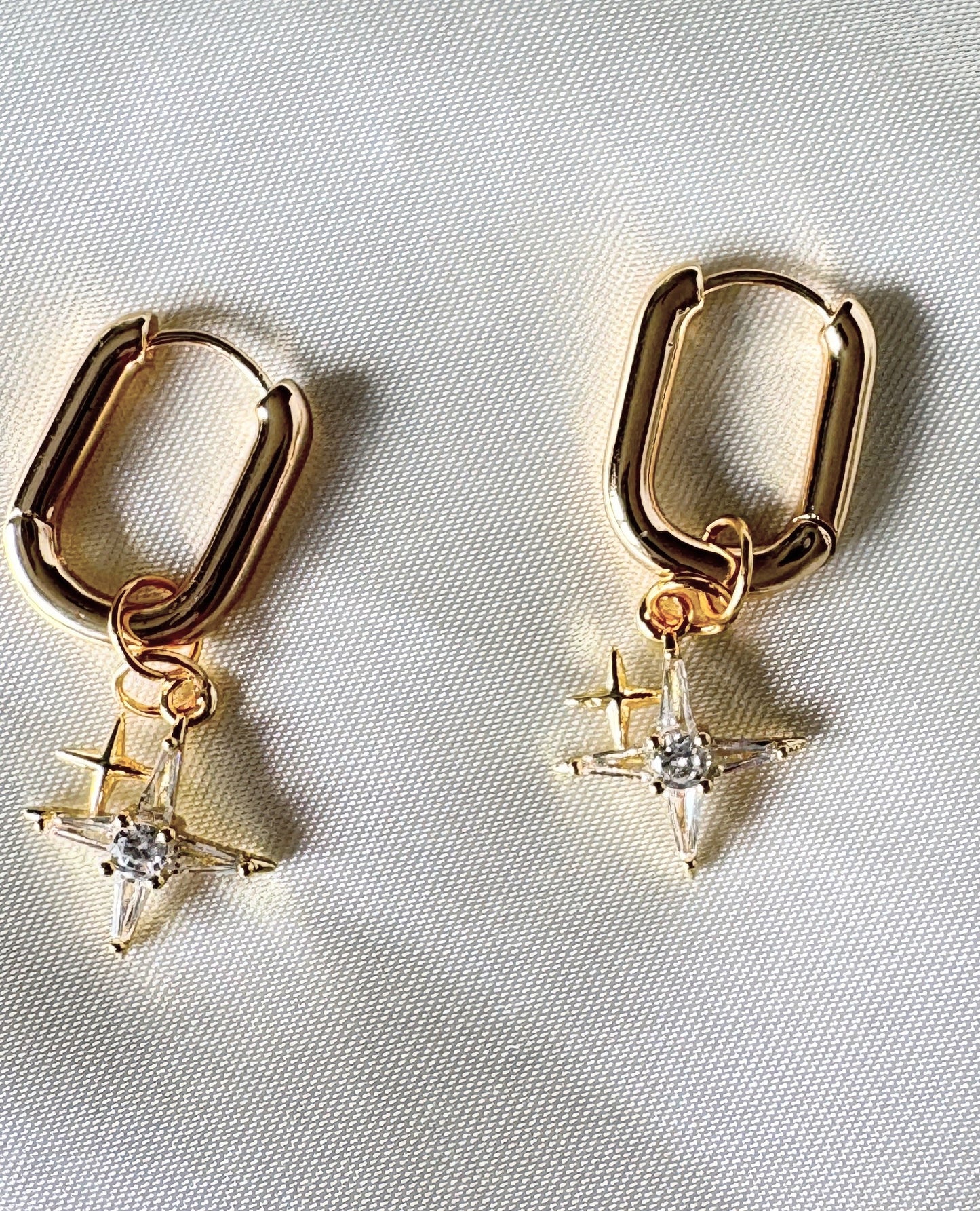 Close-up of golden crystal earrings