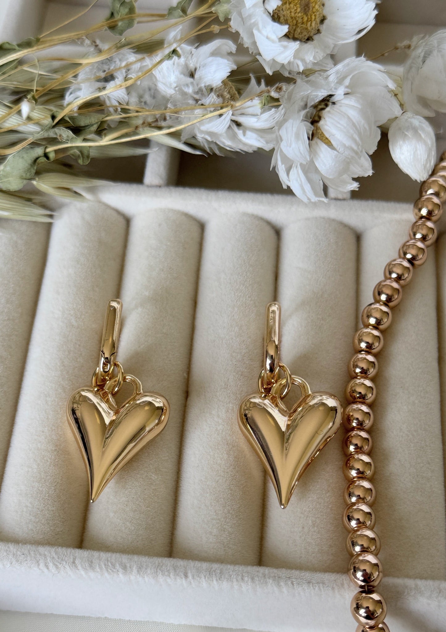 Hematite golden crystal earrings styled with matching necklace
