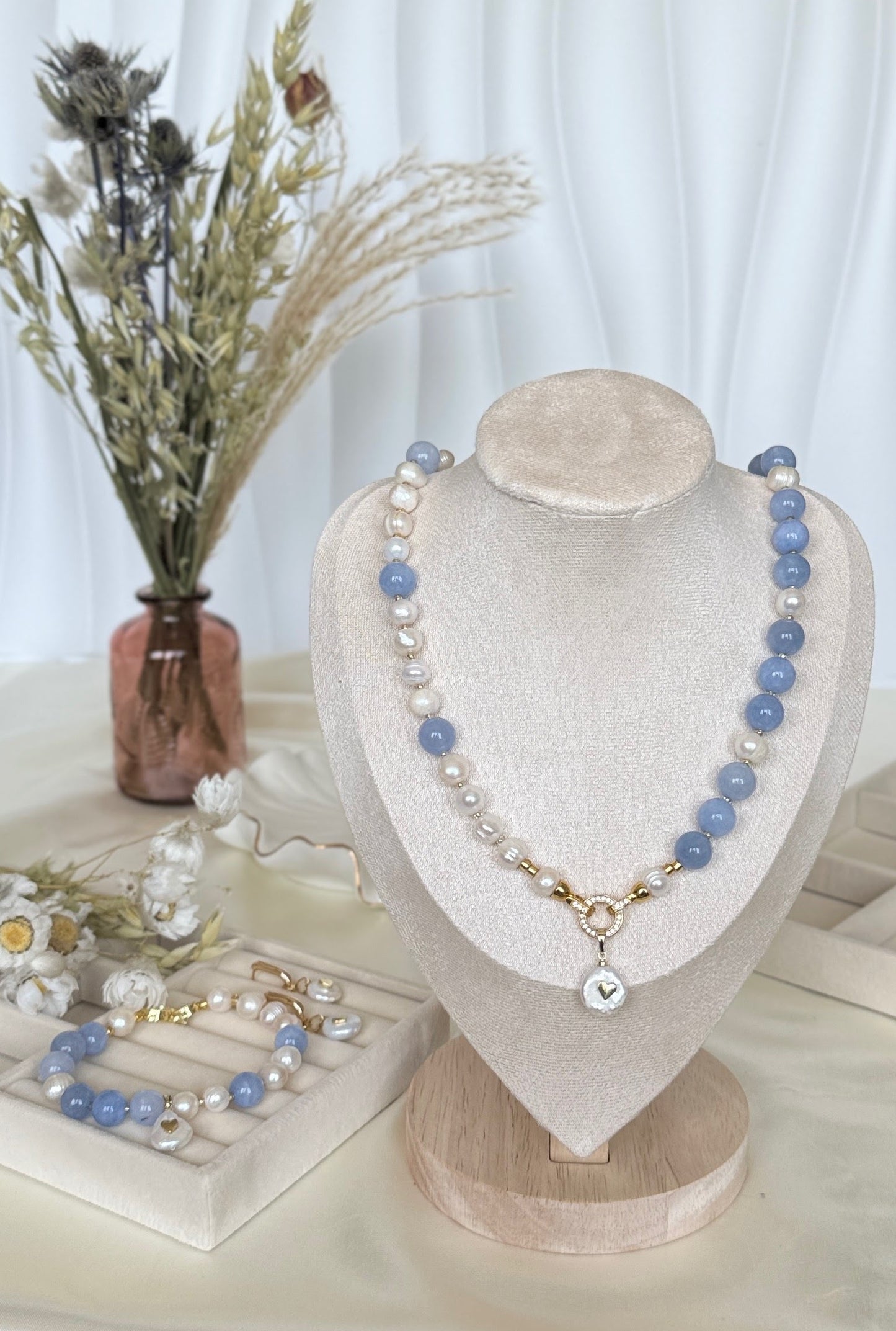 Elegant freshwater pearl and aquamarine necklace with matching bracelet
