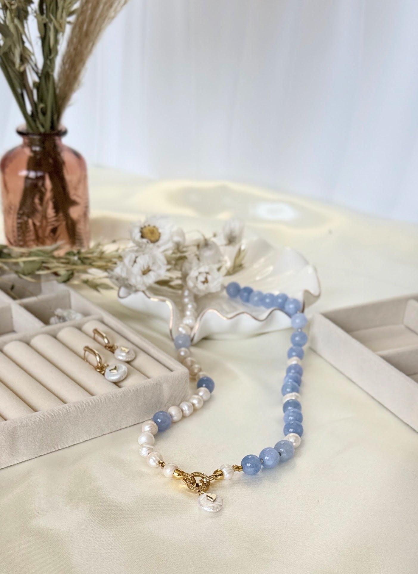 Elegant pearl aquamarine necklace paired with matching earrings