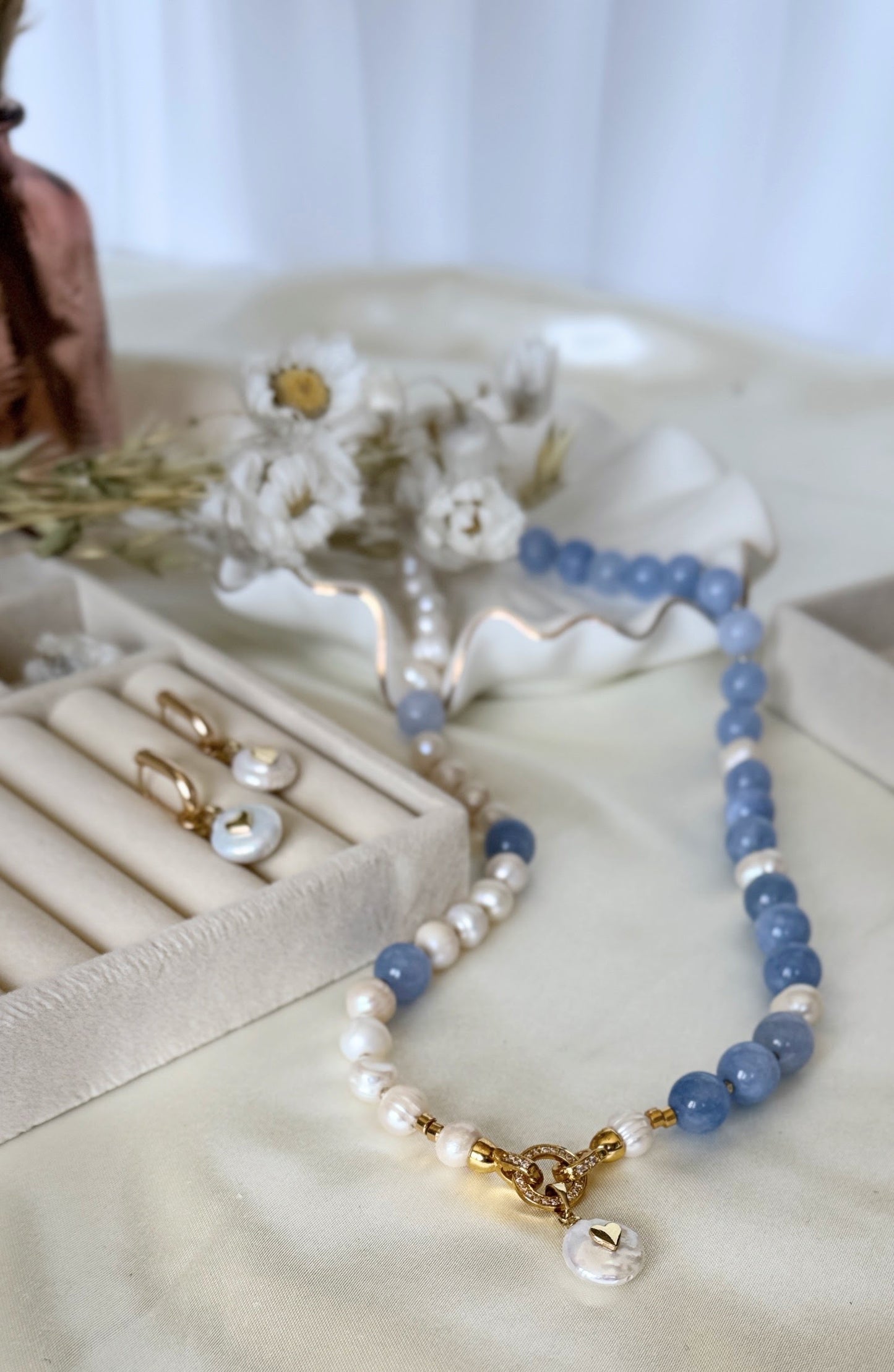 Pearl and aquamarine jewelry set with necklace and earrings