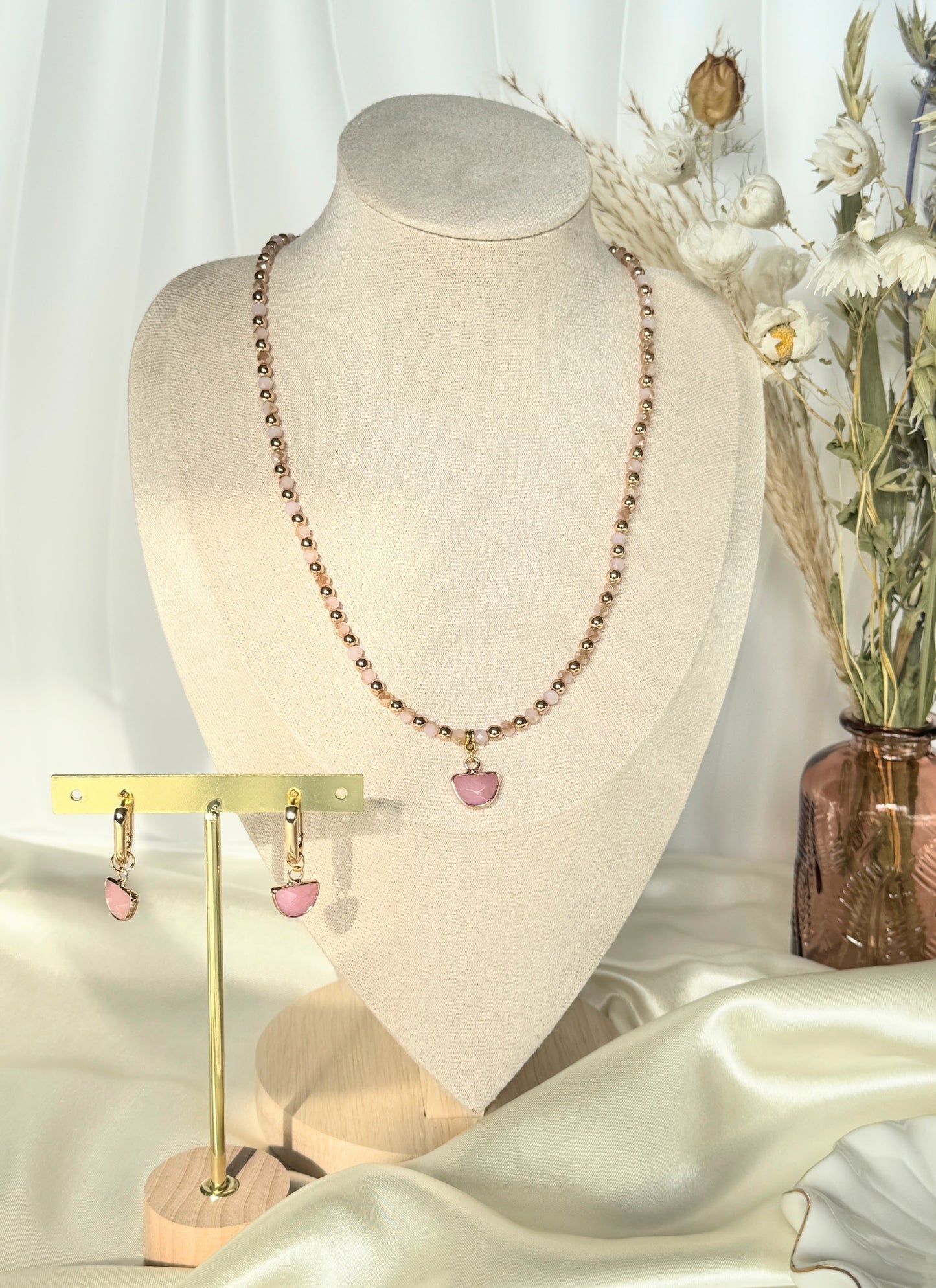 Elegant pearl and pink hematite necklace paired with matching earrings