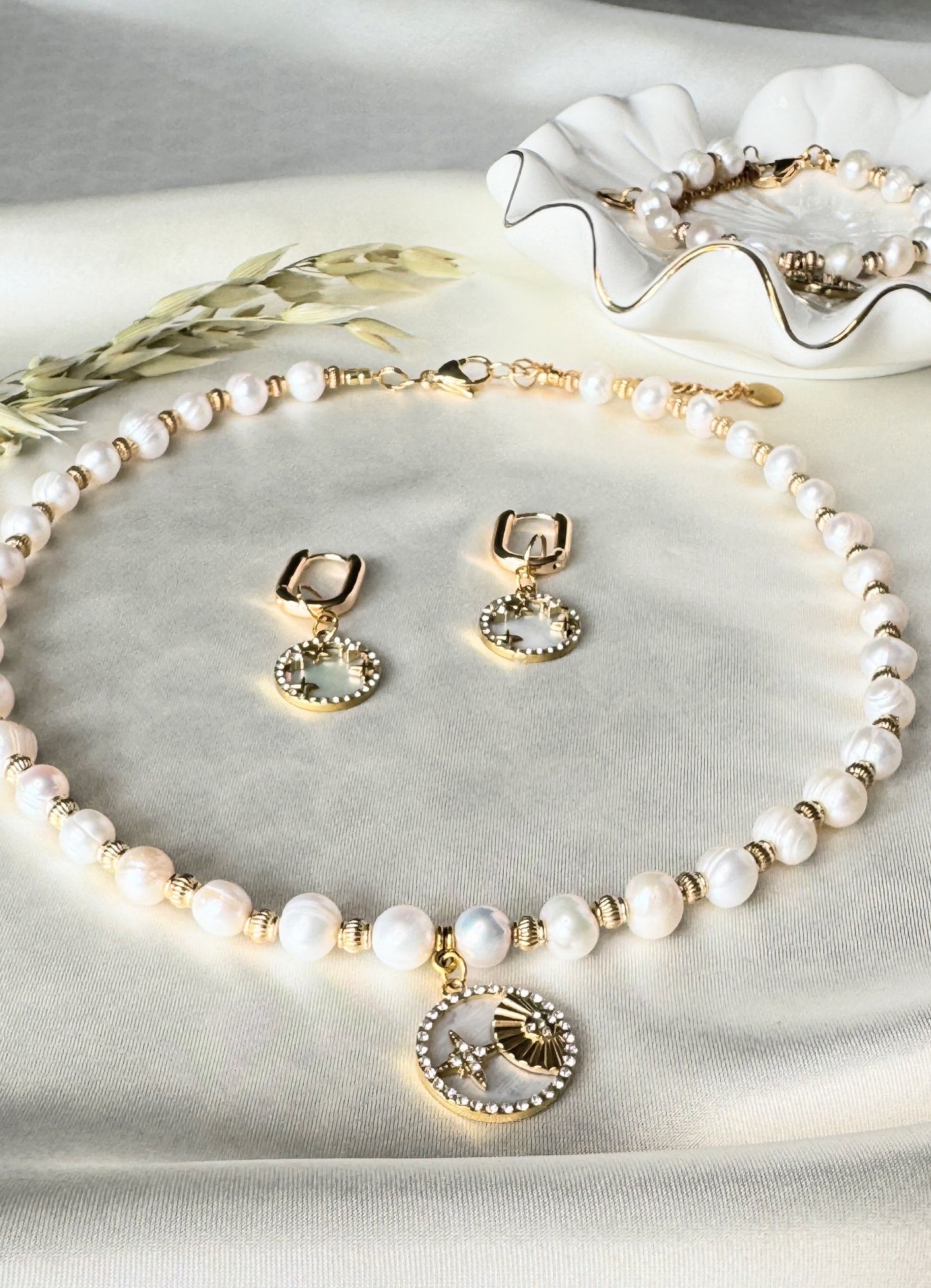 Mother-of-pearl necklace and matching earrings jewelry set with gold accents