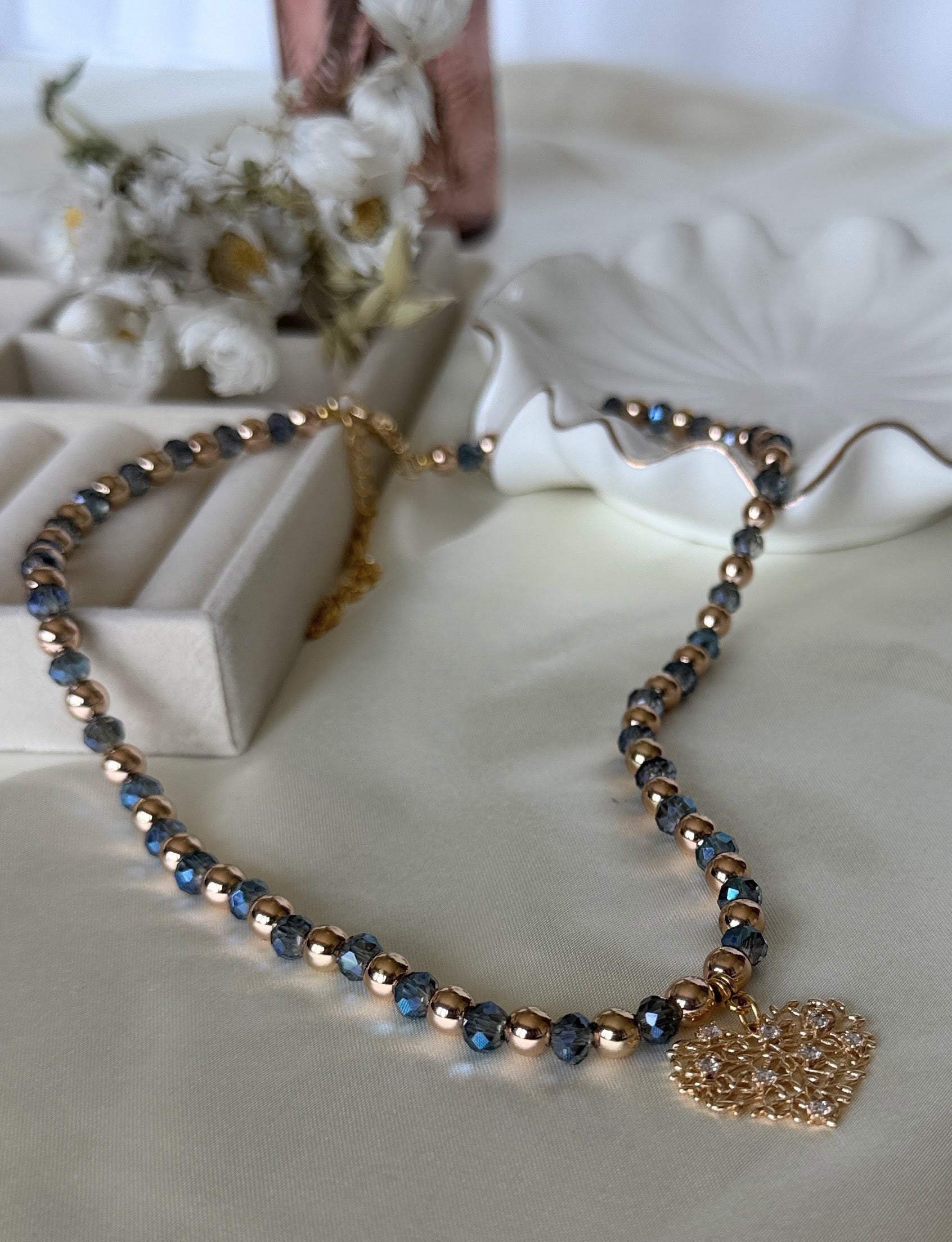 Tree of life pendant on blue crystal hematite beaded necklace