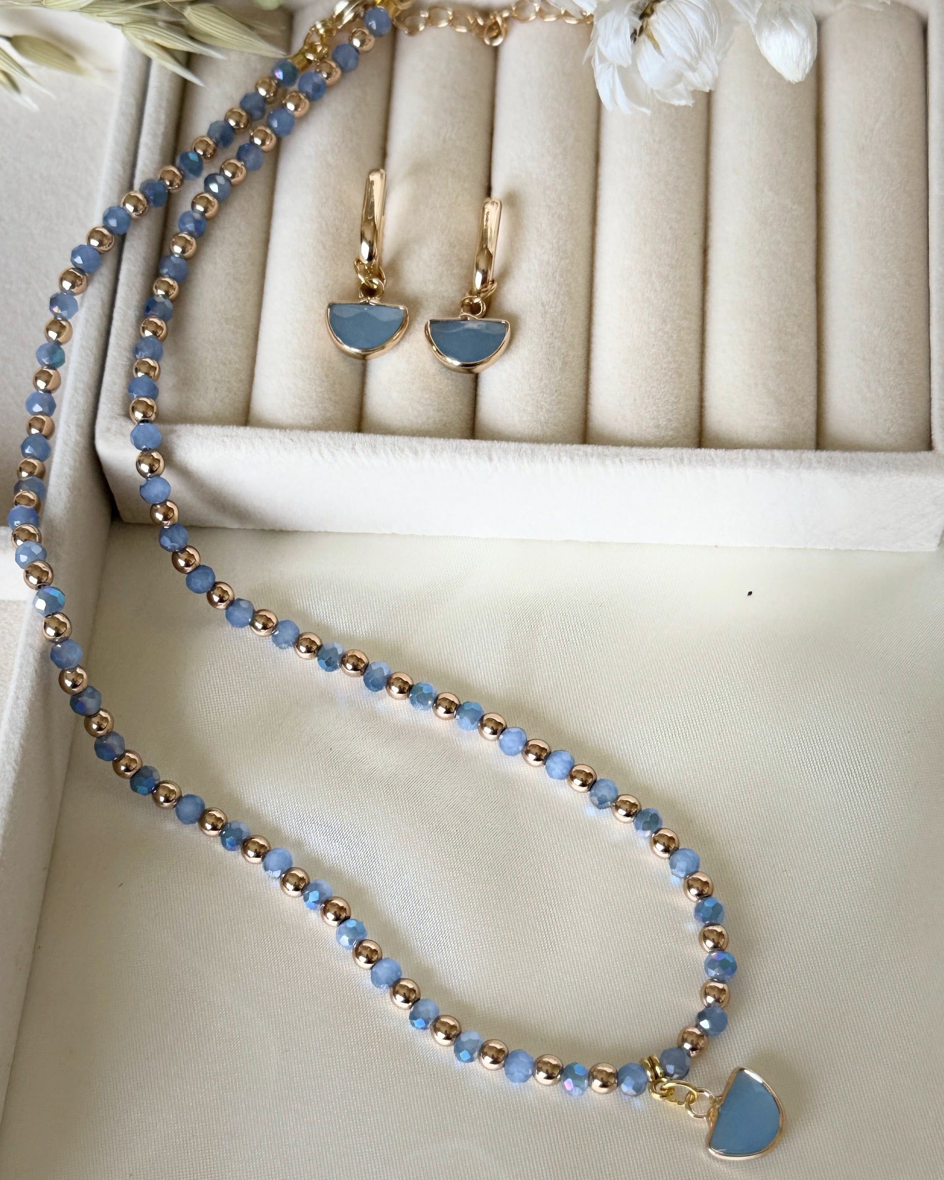 Layered blue hematite and crystal necklace with earrings set