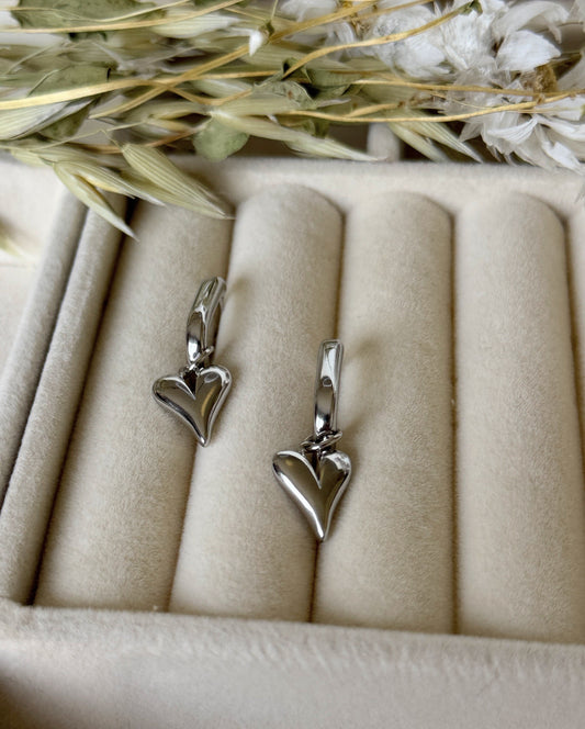 Hematite silver crystal heart earrings with dangling design