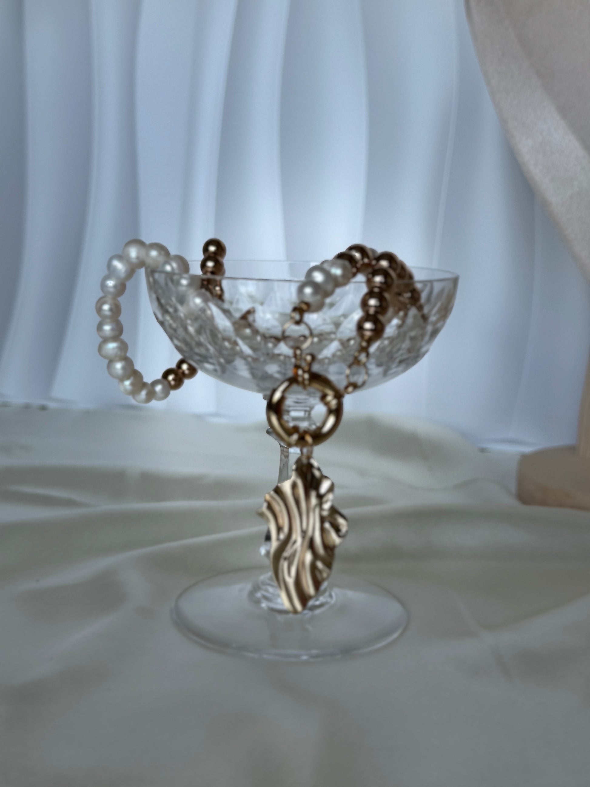 Freshwater pearl necklace with golden hematite beads on gold chain