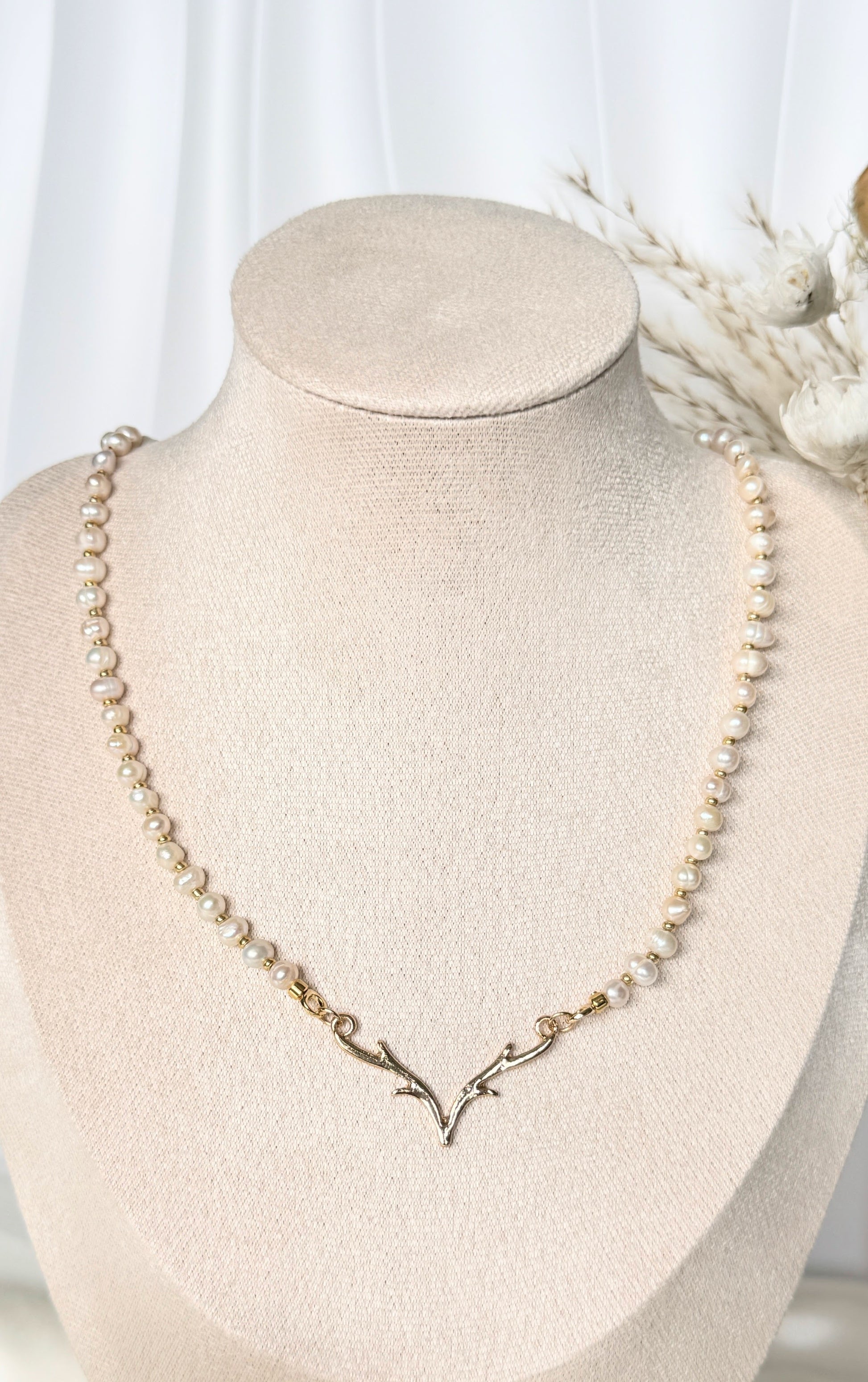 Adjustable clasp of deer pearl necklace with gold antler pendant