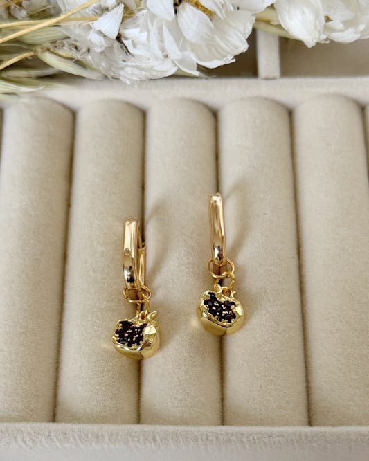 Golden pomegranate earrings with deep red garnet beads and gold hooks